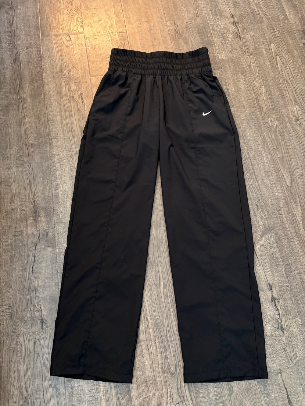 Nike Black Wide-Leg Track Pants with White Swoosh Accent